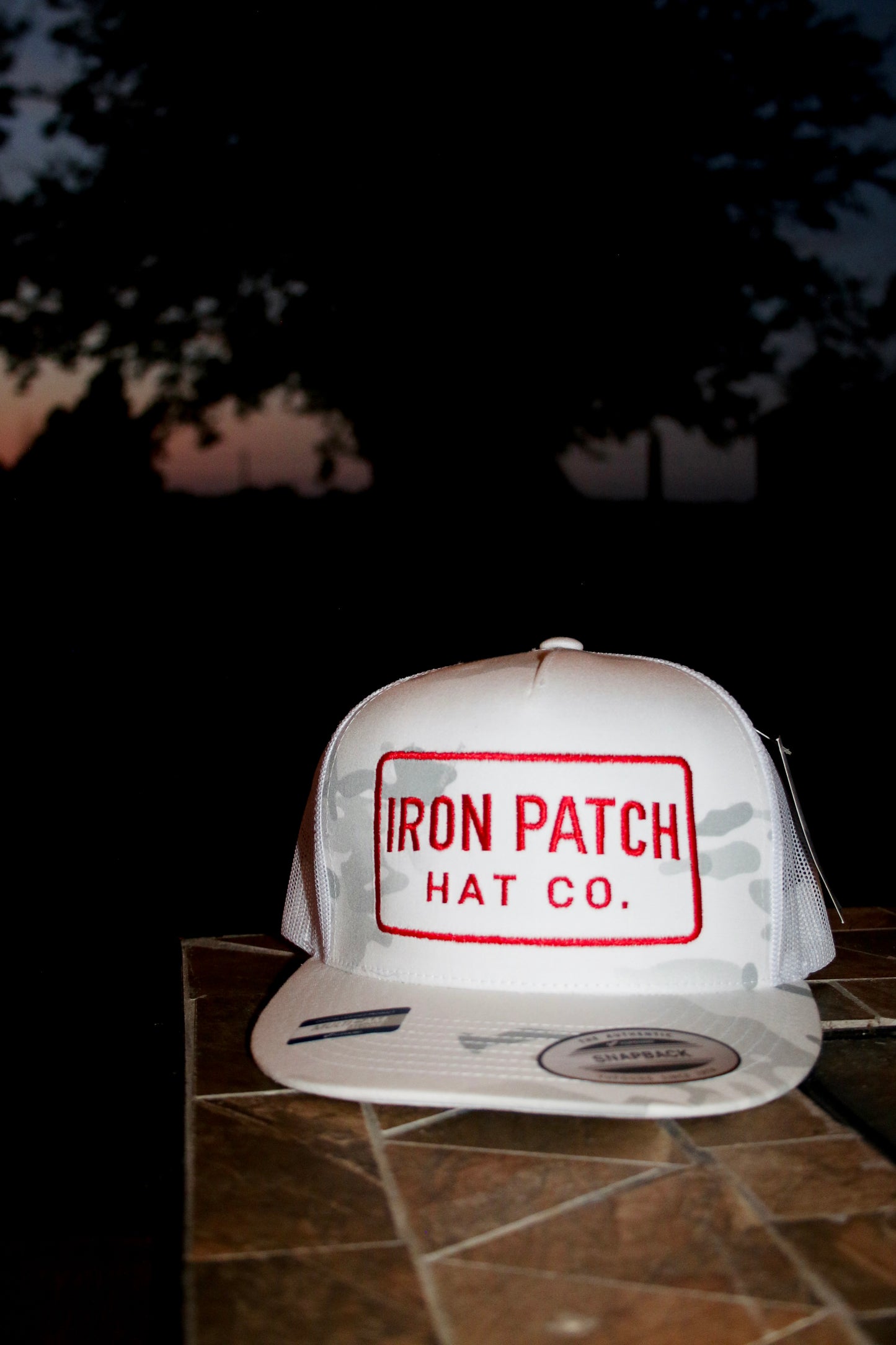 Iron patch trucker hat
