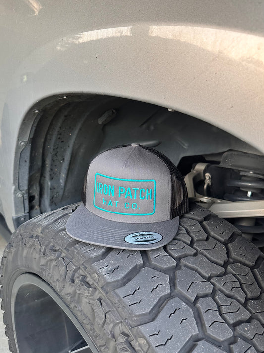 The Asphalt (Charcoal/Teal Trucker)